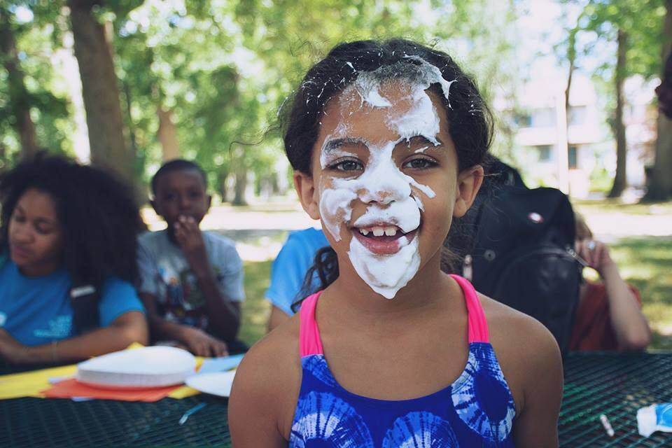 Girl with pie on her face