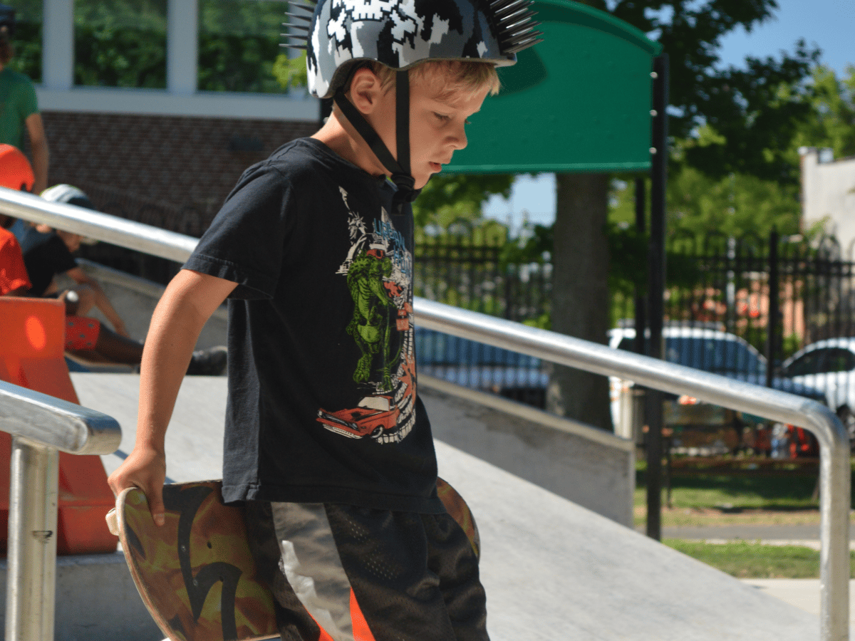 kid with skateboard